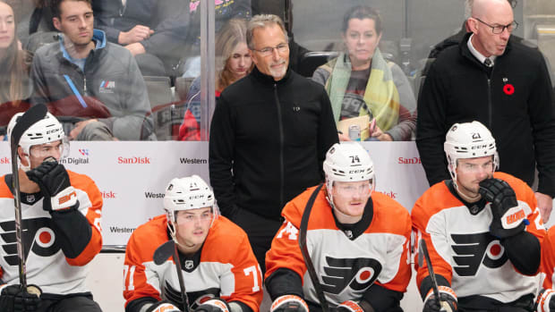 Nov 7, 2023; San Jose, California, USA; Philadelphia Flyers head coach John Tortorella watches the play against the San Jose Sharks from the bench during the third period at SAP Center at San Jose.